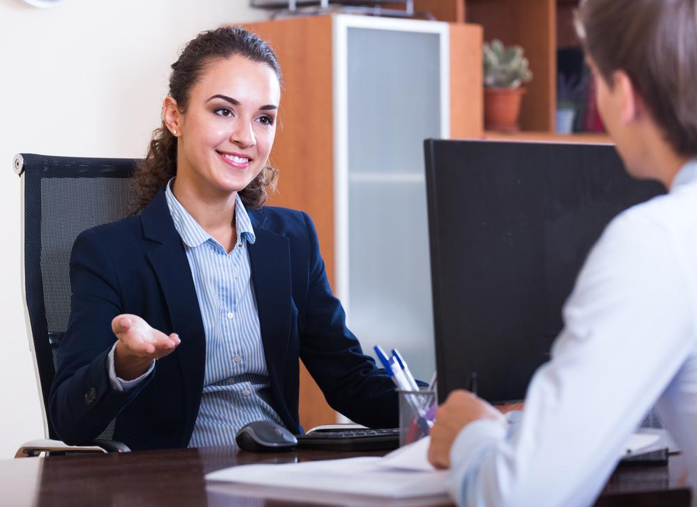 female administrator talking in office